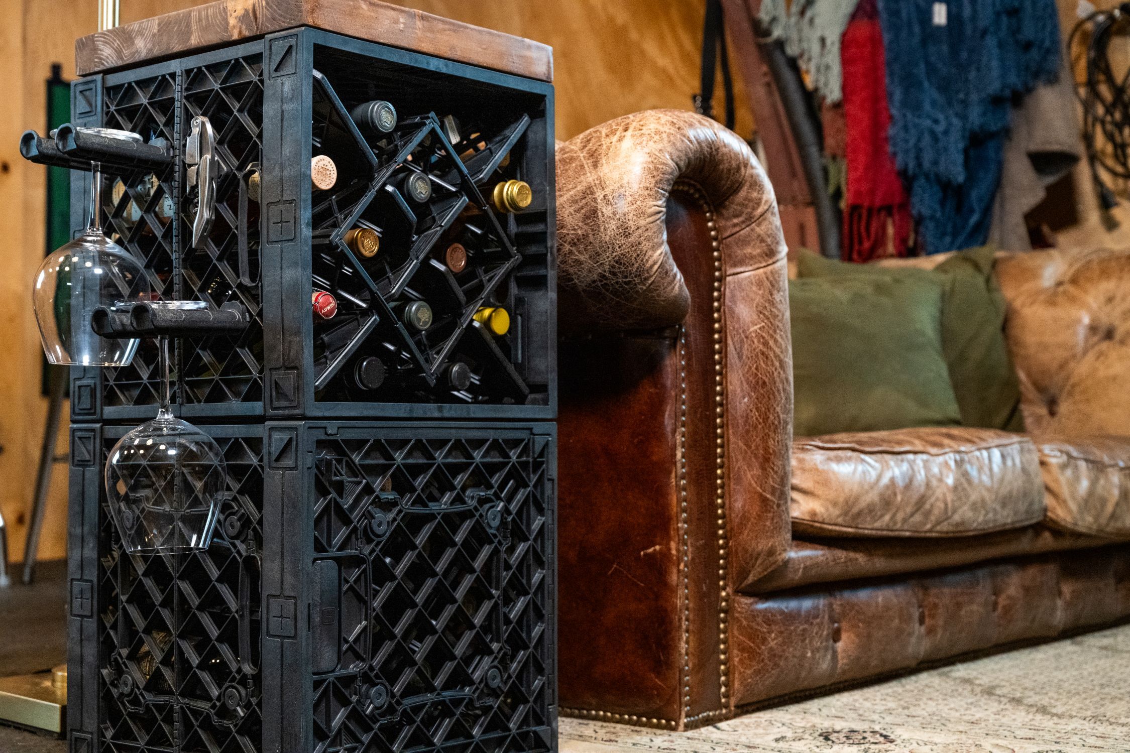 Home bar system wide shot with wine, glass holders, and modular crates.