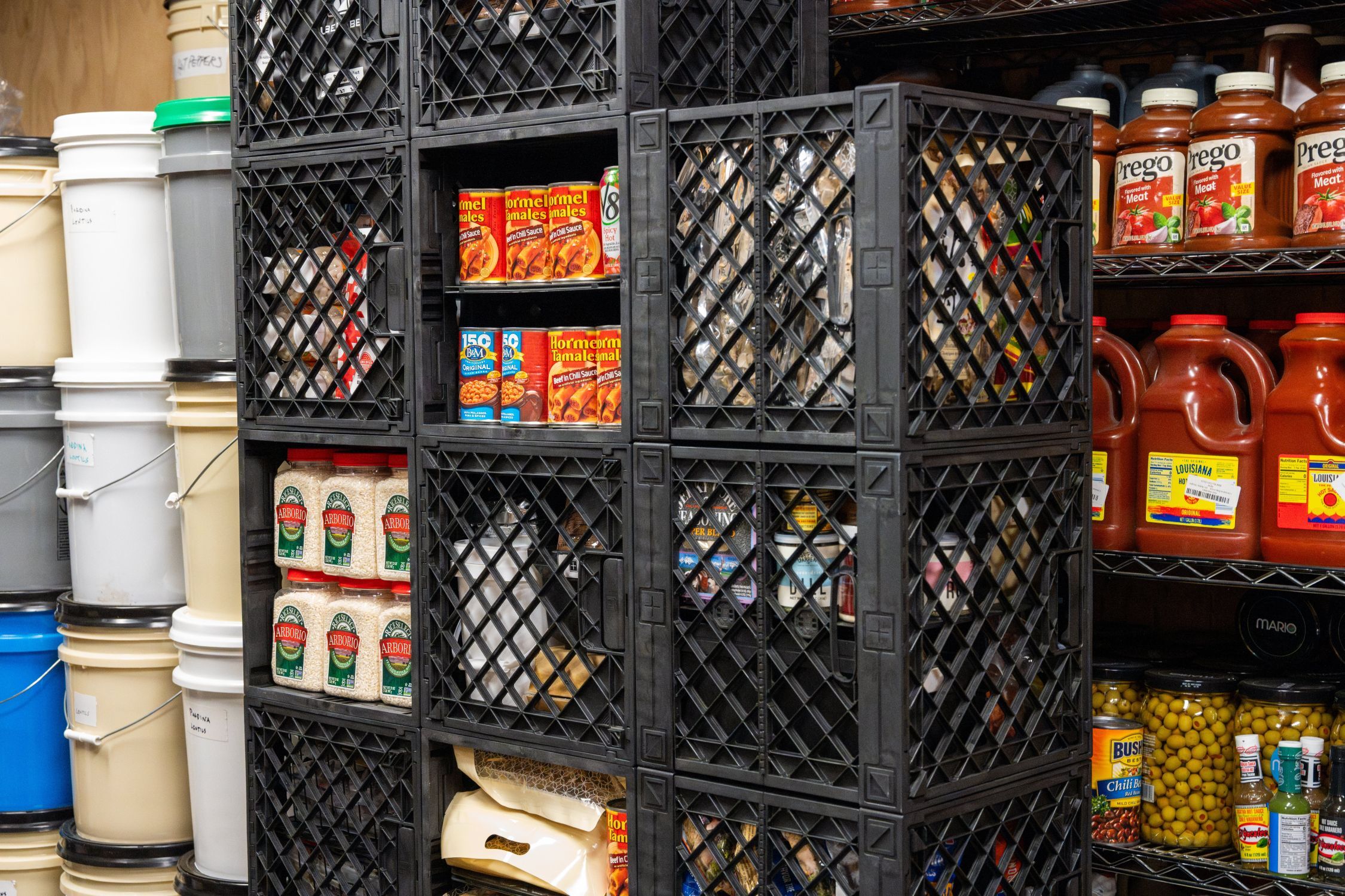 UbeCube&trade; crates used as a modular prepper pantry tower for canned goods, dry food, bulk storage, and emergency supplies.