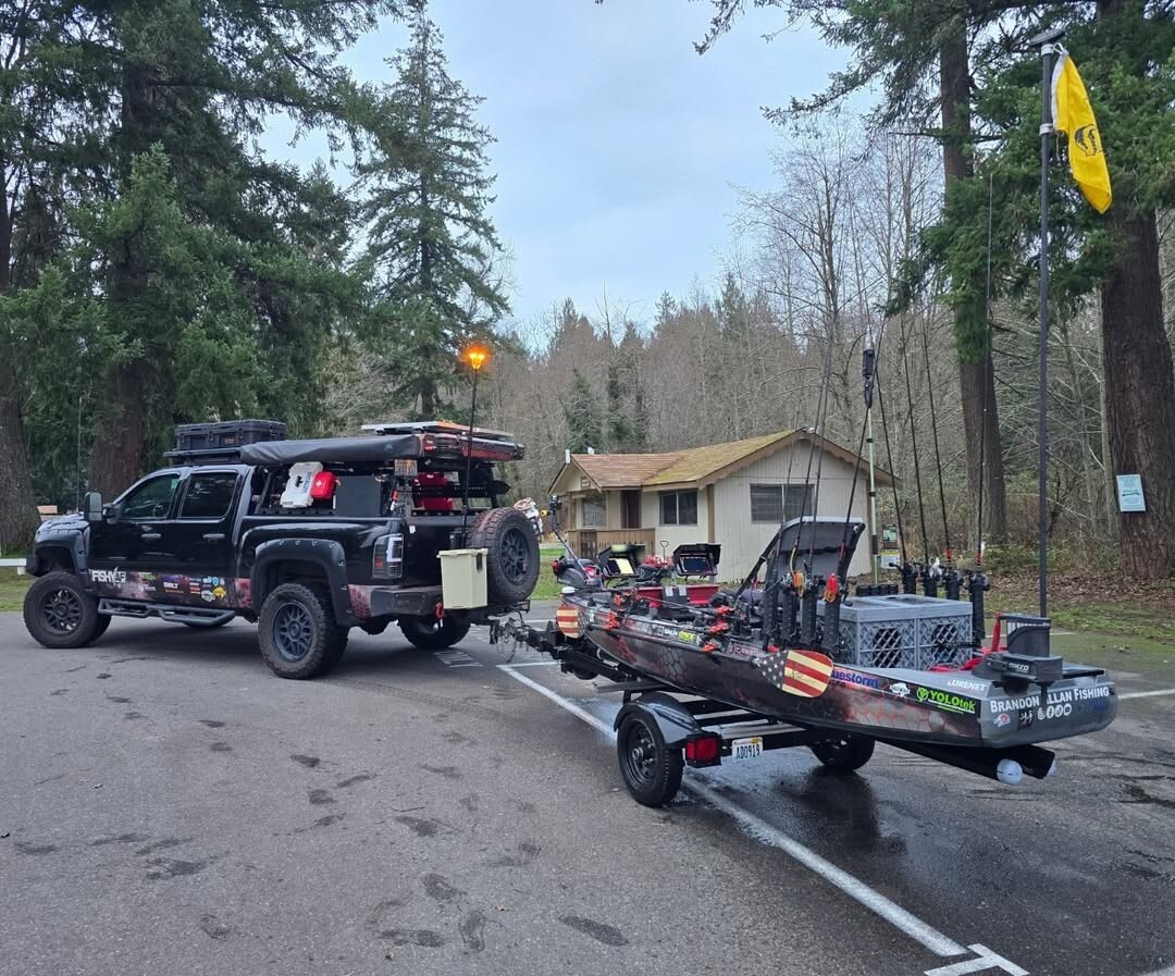 Brandon Henning’s fully equipped fishing kayak and tow vehicle with a double-crate UbeCube storage setup.